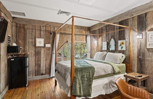 Townsend Hotel | Wood-Paneled Room | 4-Poster Bed | Smoky Mountain Stay