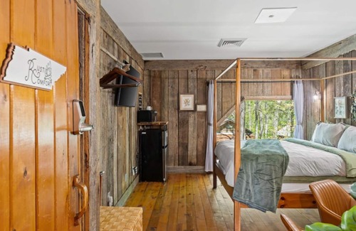 Townsend Hotel | Wood-Paneled Room | 4-Poster Bed | Smoky Mountain Stay