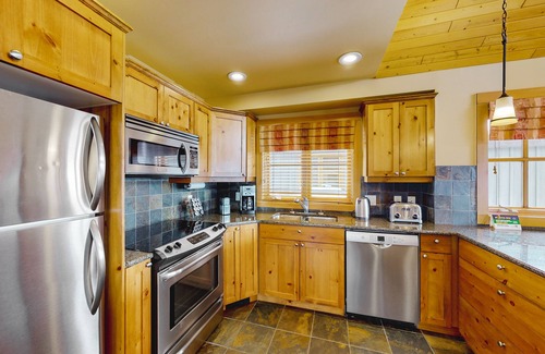 Big White Ski Resort Cabin | Woodcutter Cabin 16 | Snowy ski-in/out getaway with private hot tub & fireplaces
