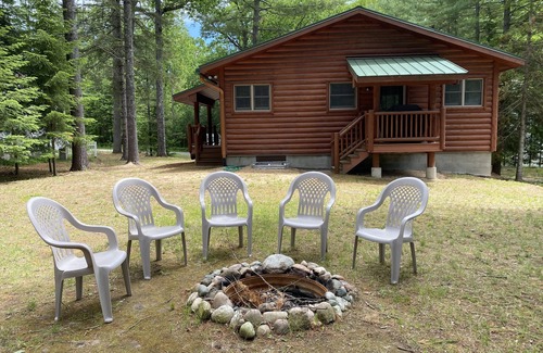 Topinabee Cottage | Wooded property in Northern Michigan. Great location for ice fishing on Mullett!