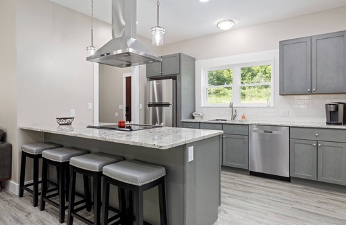 Cedar House | Wooded tranquil Retreat: Hot tub and fire pit. Just 8 miles from Traverse City!