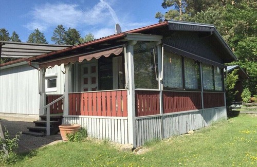 Waldsiedlung Romerstraße House | Wooden holiday home with winter garden