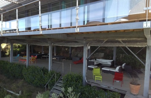 Pietrosella House | Wooden lodge on piles nestled in the scrubland,view over the Bay of Ajaccio