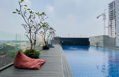 Pondokcina Apartment | Wooden Nest 2Br Without Living Room At Evenciio Margonda Apartment