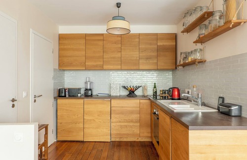 Arsenal Apartment | Wooden Warmth, by Veeve