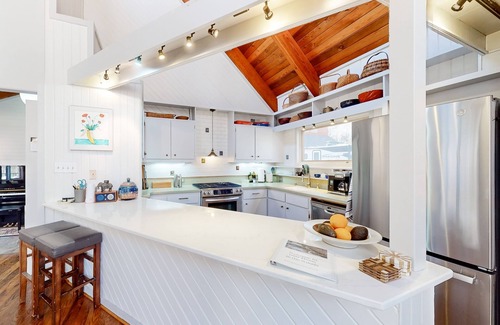 Durham House | Woodland acreage with 60' deck on gurgling brook, pizza oven, rec area & library