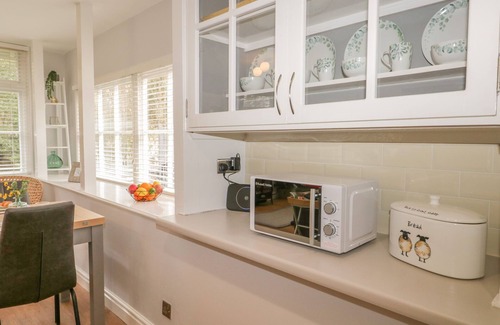 Meathop Cottage | WOODLAND LODGE, romantic, with a garden in Grange-Over-Sands