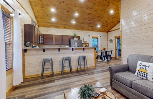 Sevierville Cabin | Woodland Retreat w/Hot Tub, Scenic Porches & Free Attraction Tickets