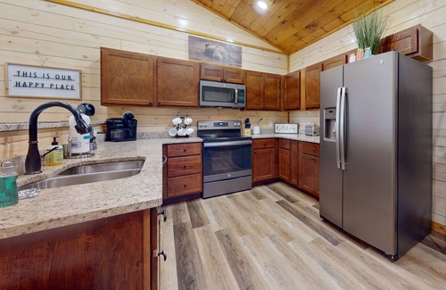 Sevierville Cabin | Woodland Retreat w/Hot Tub, Scenic Porches & Free Attraction Tickets