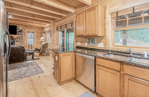 Saugatuck Cabin | Woodsy cabin with private hot tub, shared beach access & screened porch