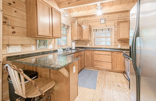 Saugatuck Cabin | Woodsy cabin with private hot tub, shared beach access & screened porch