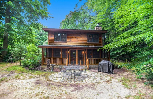 Saugatuck Cabin | Woodsy cabin with private hot tub, shared beach access & screened porch