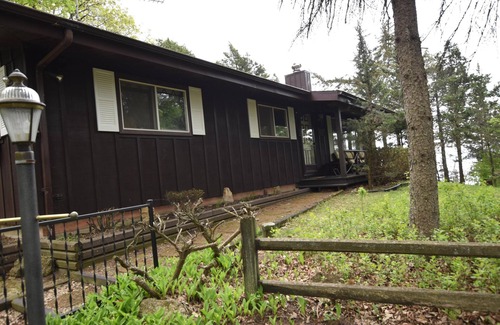 Green Lake Cabin | Woodsy Lakefront Retreat high above Green Lake