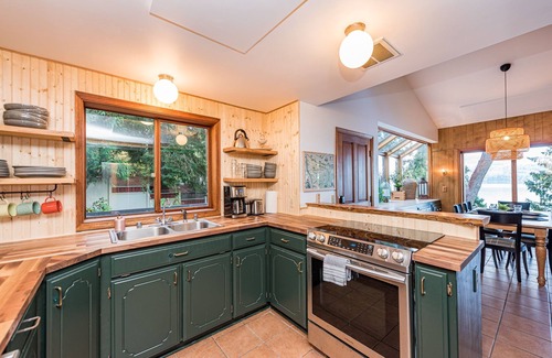 Adelma Beach Cabin | Woodsy Waterfront: Hot Tub, Sauna, Movie Theater & Fireplace!