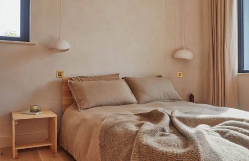 Ballycastle Apartment | Yarn - Milo is a spacious luxury suite king size bed, bathroom & living/kitchen