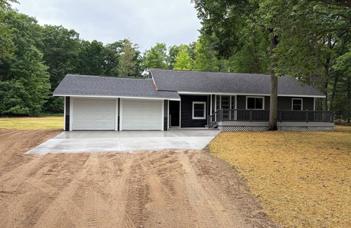 Lake City House | Year-round 3BR/2BA trailside house & 4 electric campsites near Lake Missaukee