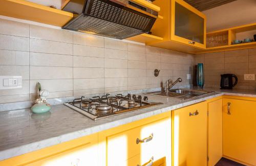 Le Cure Apartment | Yellow Home by MMega