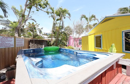 Siesta Key Village Cottage | Yellow Palm Cottage steps from the beach