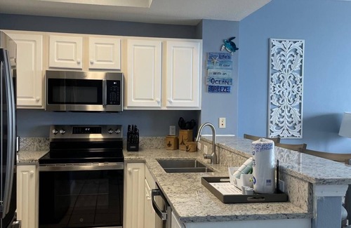Navarre Beach Condo | Your Beach Escape with 3 Pools, 3 Hottubs, and Emerald Coast Beach Views!