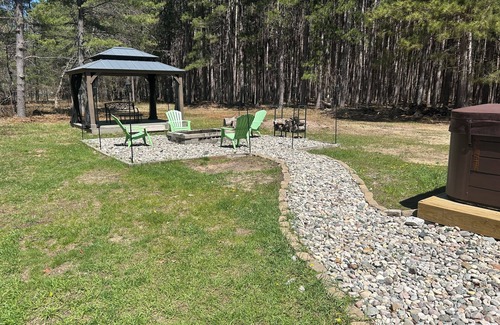 Kalkaska House | Your Cozy Boho Cabin In The Woods Located In Grayling Michigan!