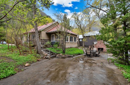 Snowbird House | Your creekside cabin is nestled between mountains and a crisp babbling brook