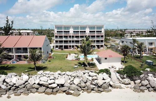 Williams Town Condo | Your oceanfront row seat to a spectacular nature show!