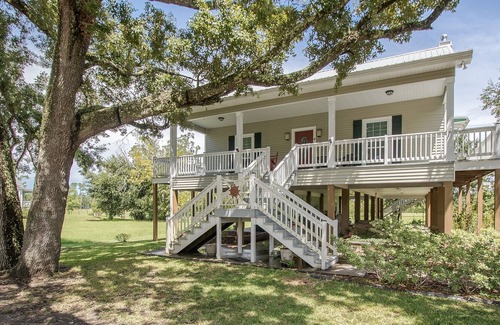 Henderson Point House | Your Only Worry Should Be If The Tide Is Going To Reach Your Chair!