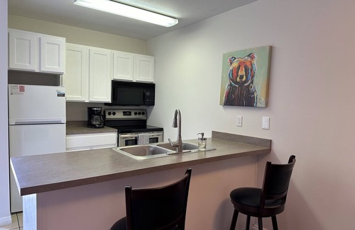 Harbor Village Condo | Your perfect home base at Bear Lake. Just a short walk to Bear Lake Marina!