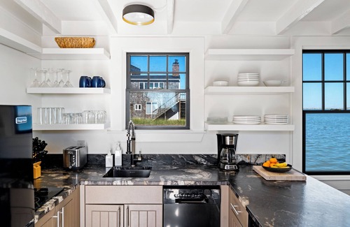 Provincetown House | Your Provincetown beach escape. Steps from the sand with panoramic baysea views.