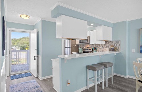 Kure Beach Condo | YOUR VIEW! Resort steps to the sand, indoor pool & hot tub Enjoy 3 outdoor pools