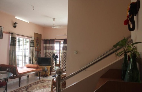 Thiruvananthapuram Bed & Breakfast | Zaatvm: Spacious room with private balcony at Sasthamangalam - only for families and solo women travellers