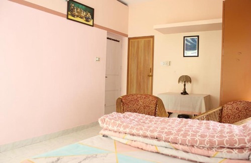 Thiruvananthapuram Bed & Breakfast | Zaatvm: Spacious room with private balcony at Sasthamangalam - only for families and solo women travellers