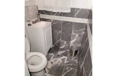 Ferguson Apartment | Zaire's Clubhouse private guest suite for two.