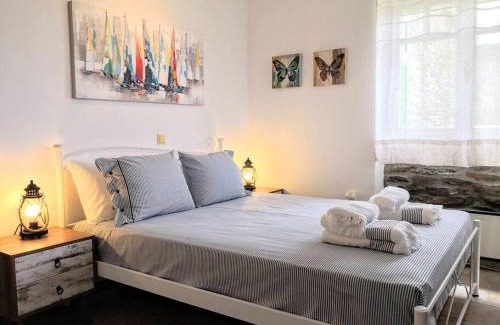 Mpatsi House | Zenios Andros-Cycladic house overlooking Batsi bay