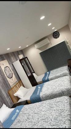 難波梅田地铁直达距离地铁站步行5分钟双床间私人浴室家庭式民宿