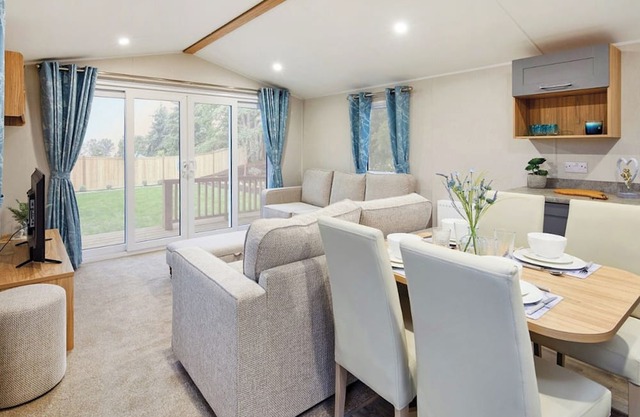 12ft-wide stylish and comfortable caravan with one double and one twin.