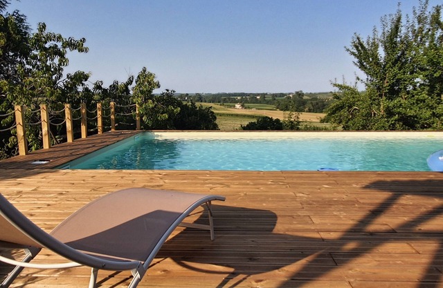 15th century house with swimming pool in the middle of orchards