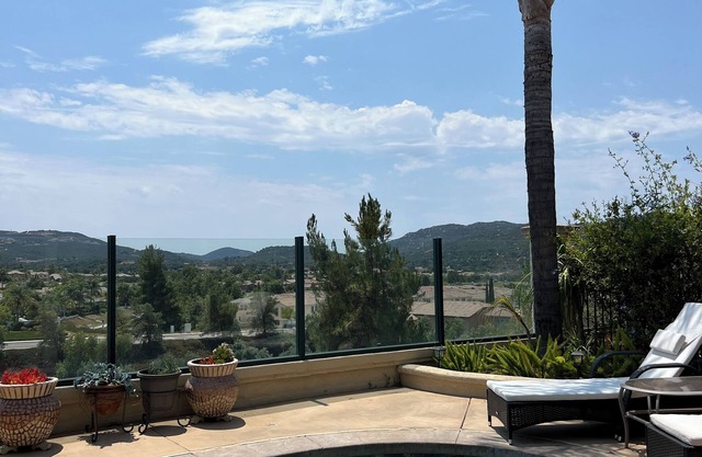 180-degree mountain views from heated spa to overlook the exquisite golf course.