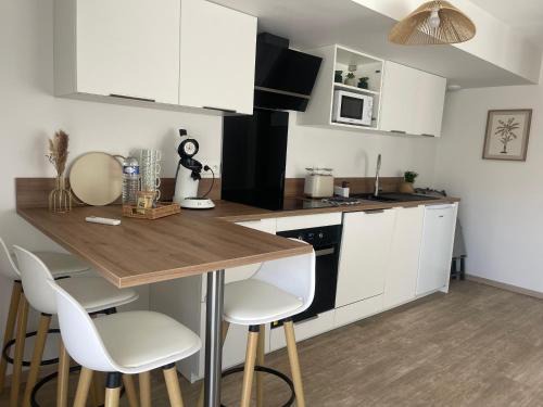 2 appartement RDC avec extérieur