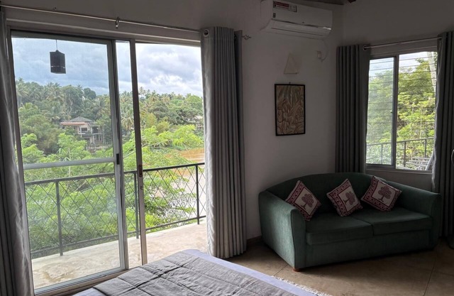 2-bedroom riverside first floor apartment in beautiful Kandy with AC, WiFi