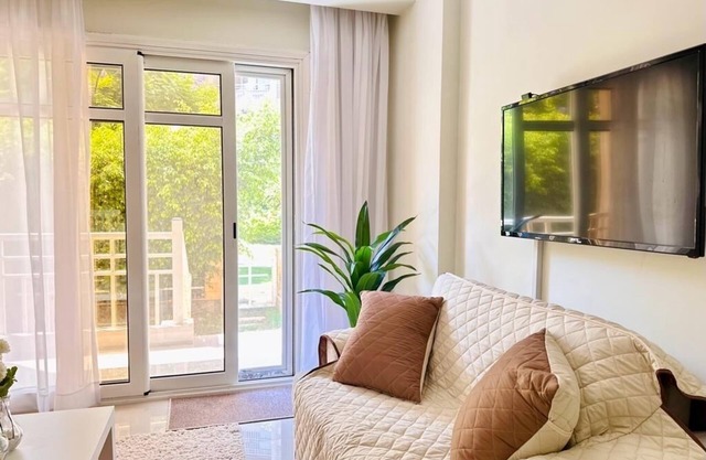 2 BR Serviced, Sunny & Modern Apartment in Madinaty with a Private Garden.