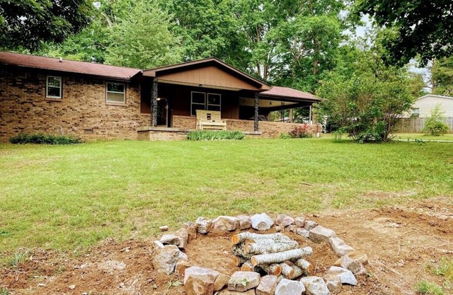 3 bedroom 2 bath ranch style house on 5 acres.