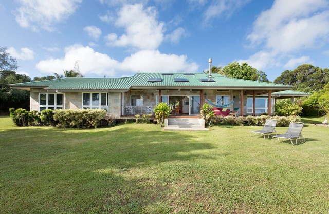 3 bedroom Custom Home on lush 10 acre private estate with sweeping ocean views
