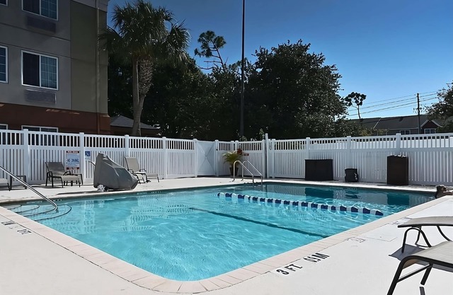 3 Large Suites with Kitchens! Perfect for Family Getaway! Outdoor Pool & Parking