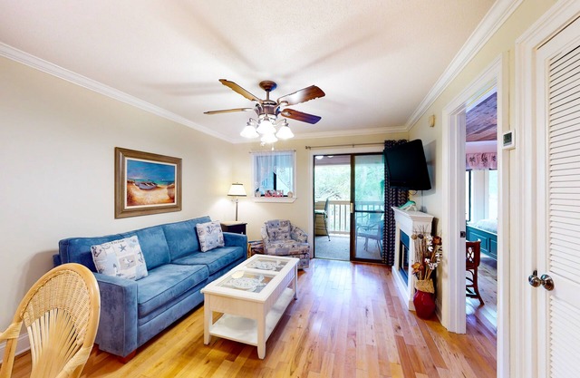 3rd-floor condo with water views, balcony, pools, gym, & beach access