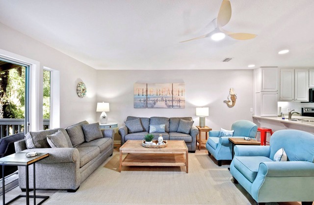 4 bedroom condo. Community pool. Close to pier/village area and beach.