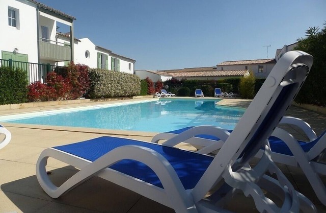 4-PERSON APARTMENT GROUND FLOOR TERRACE + HEATED POOL + PRIVATE PARKING