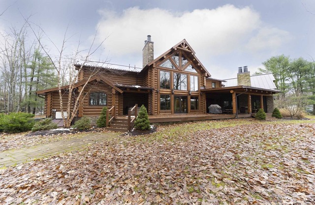 9,000 Sq Ft Authentic Log Home 2 miles from Lake Wallenpaupack –Sleeps 20