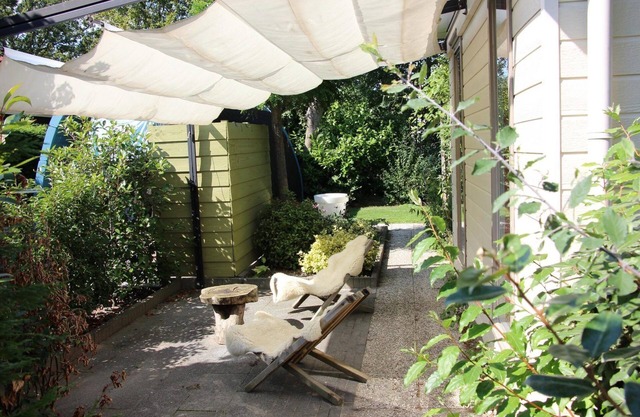 A chalet decorated with great attention to detail and a beautiful garden.