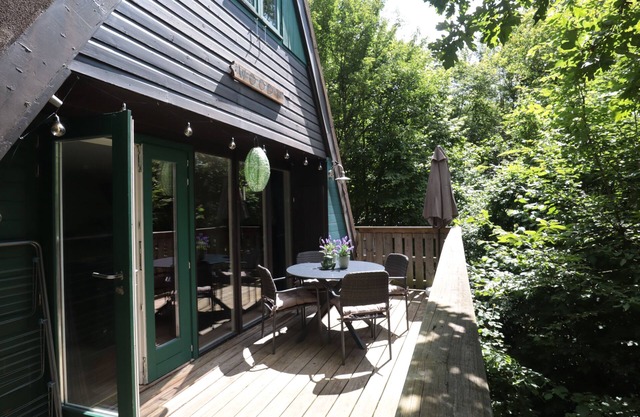 A chalet on a hill in the forest, with a beautiful view of the Ardennes.